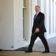 Picture this but instead of walking, he’s dancing, and instead of being at the White House, he’s in a ballroom. Image via Getty.